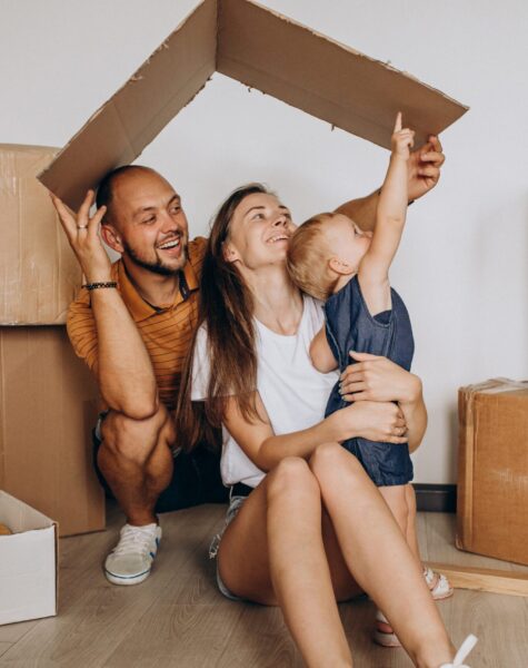 Young family with little daughter moving into new house Young family with little daughter moving into new house